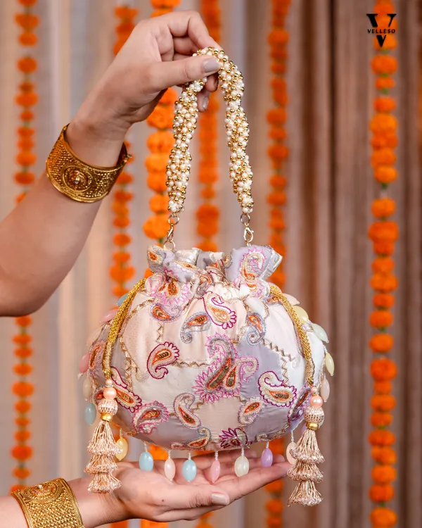 Sitara_Round_Potli_Bag_with_Pastel_Paisley_Embroidery_&_Pearl_Handle